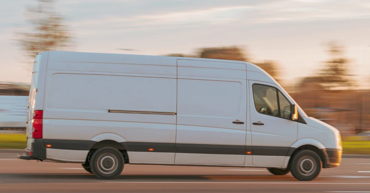 White delivery van on the road